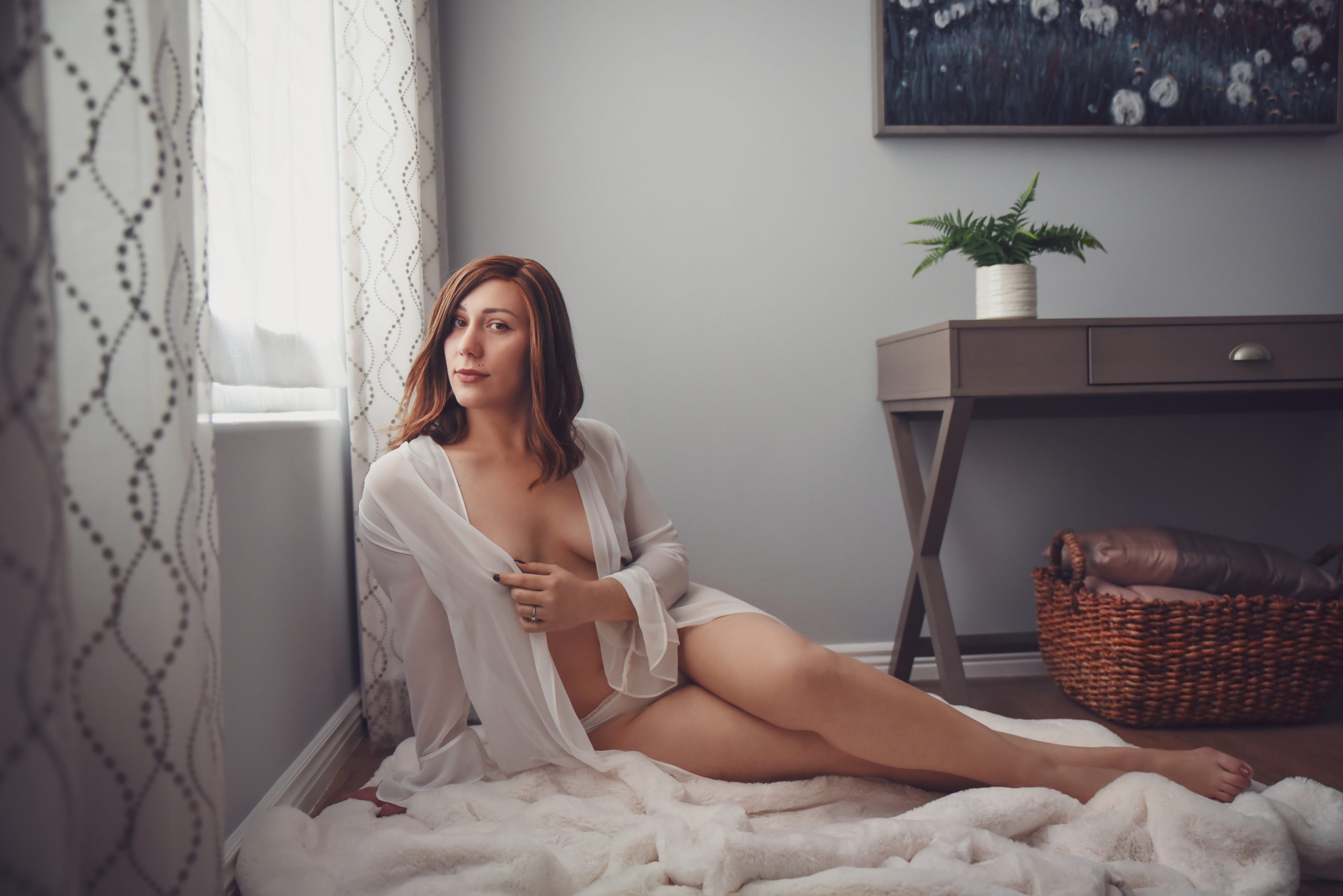 Miss J boudoir photo white robe on white blanket